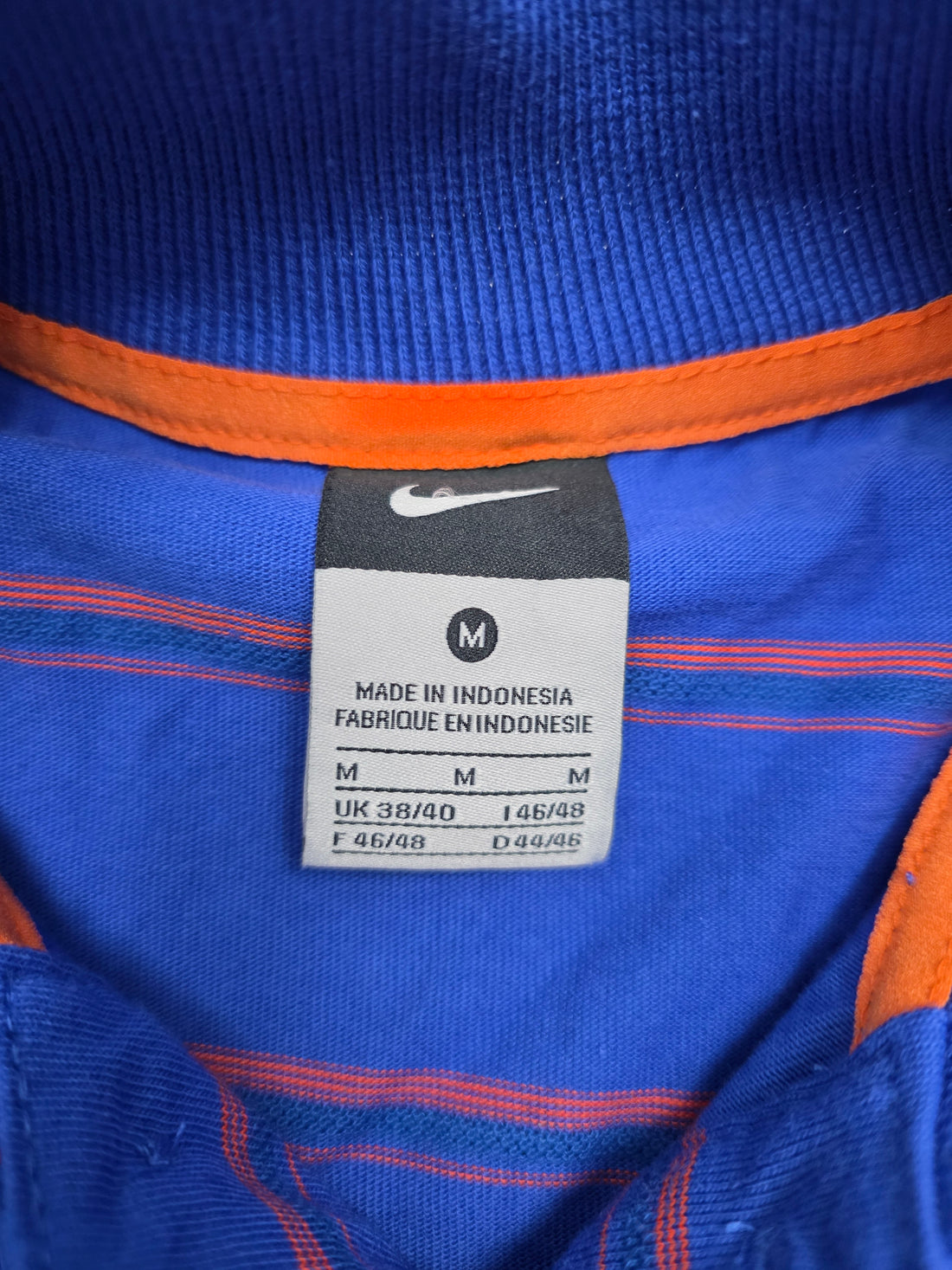 Nike Polo in Blau/Orange – Frontansicht