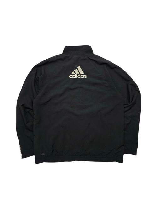 Rückansicht der Adidas Vintage Trackjacket mit großem weißem Big Logo und grauen Seitenpanels
