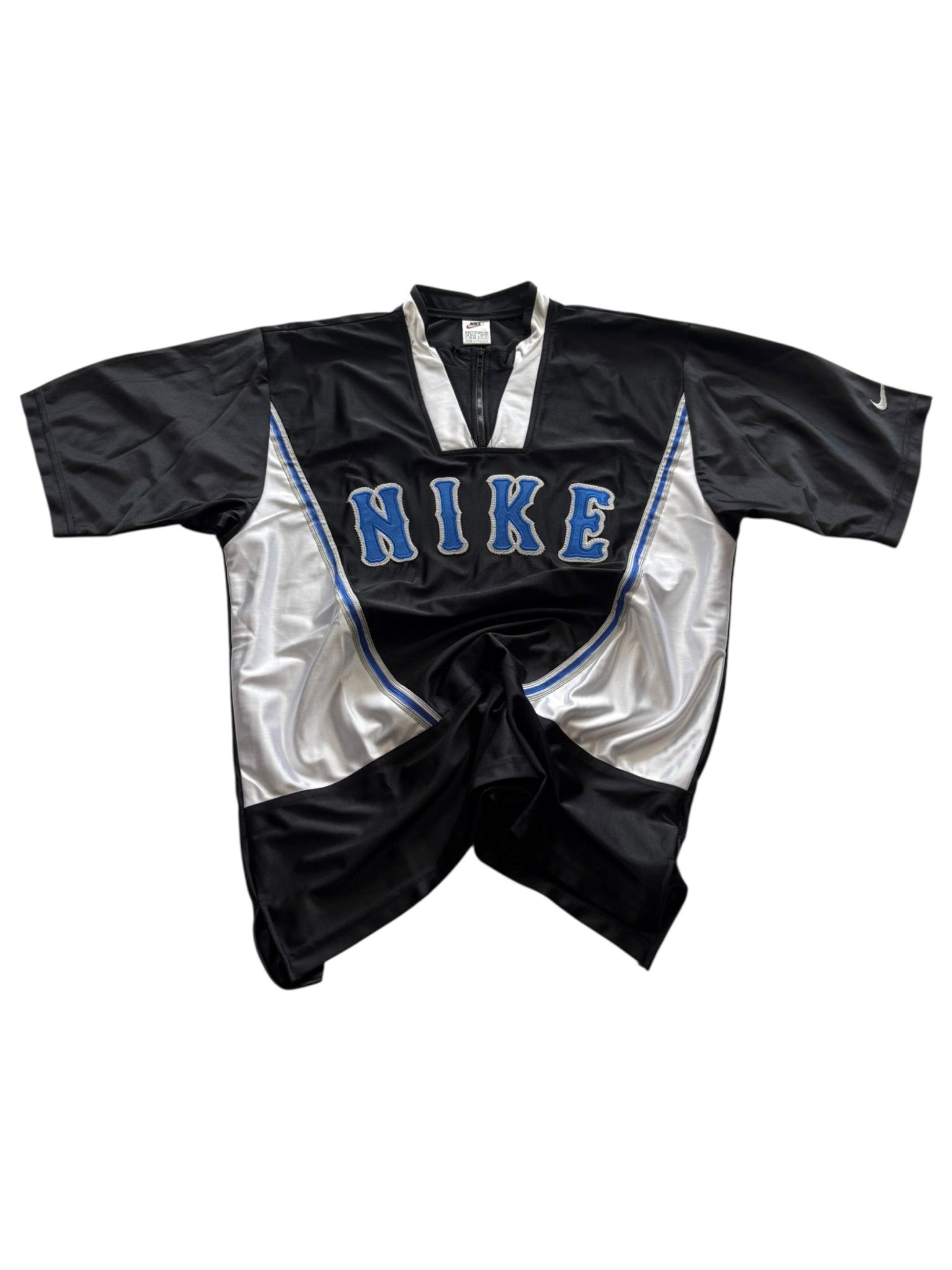 Nike Big Logo Vintage Trikot in Schwarz und Weiß mit großem NIKE Chenille-Logo und weißen Seiteneinsätzen
