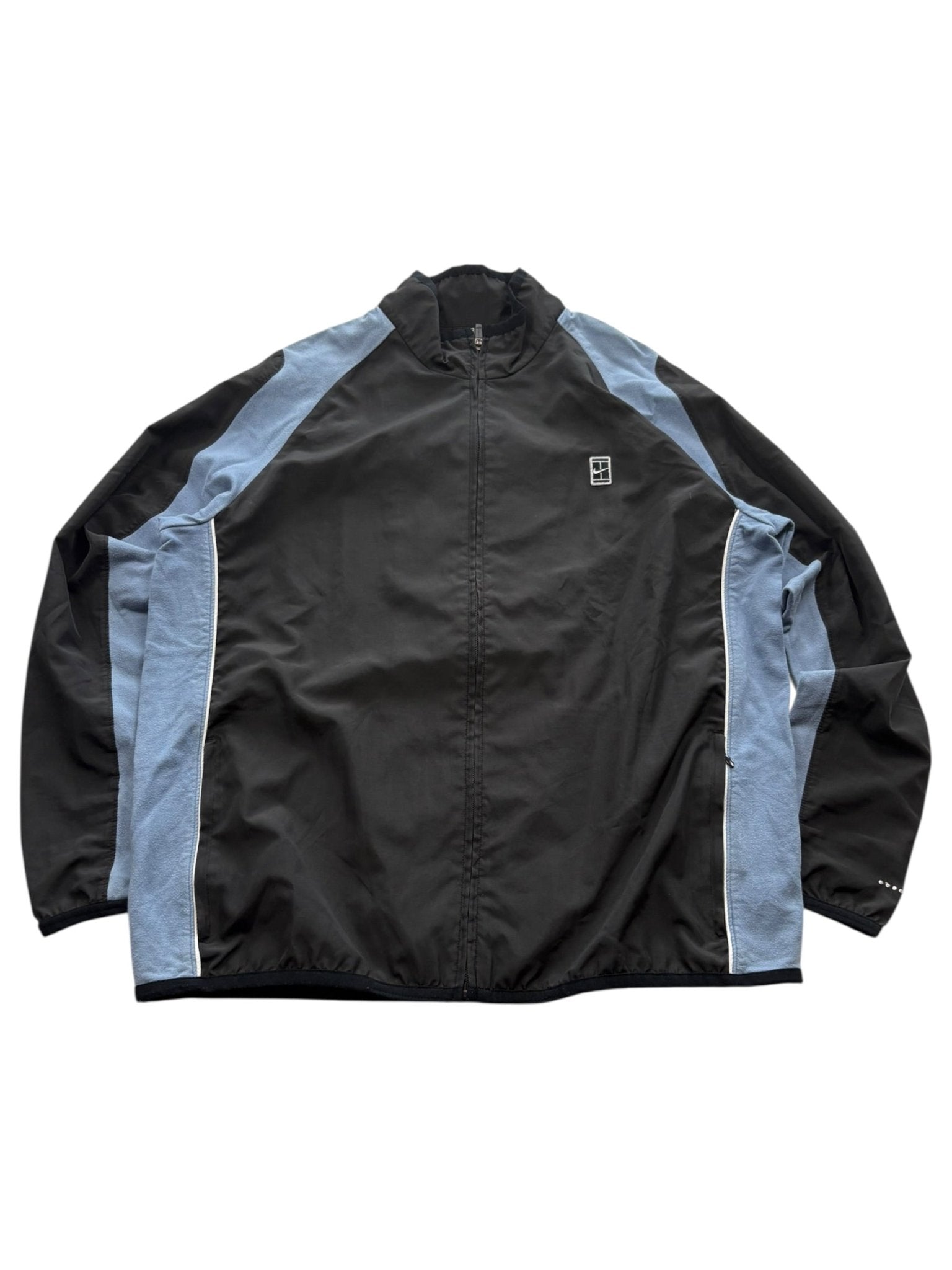 Nike Vintage Trackjacket in Schwarz mit hellblauen Panels, weißem Piping und kleinem Patch-Logo