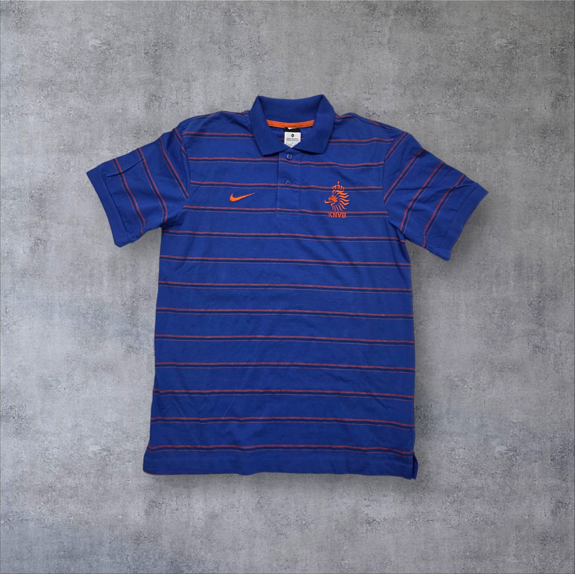 Nike Polo in Blau/Orange – Frontansicht
