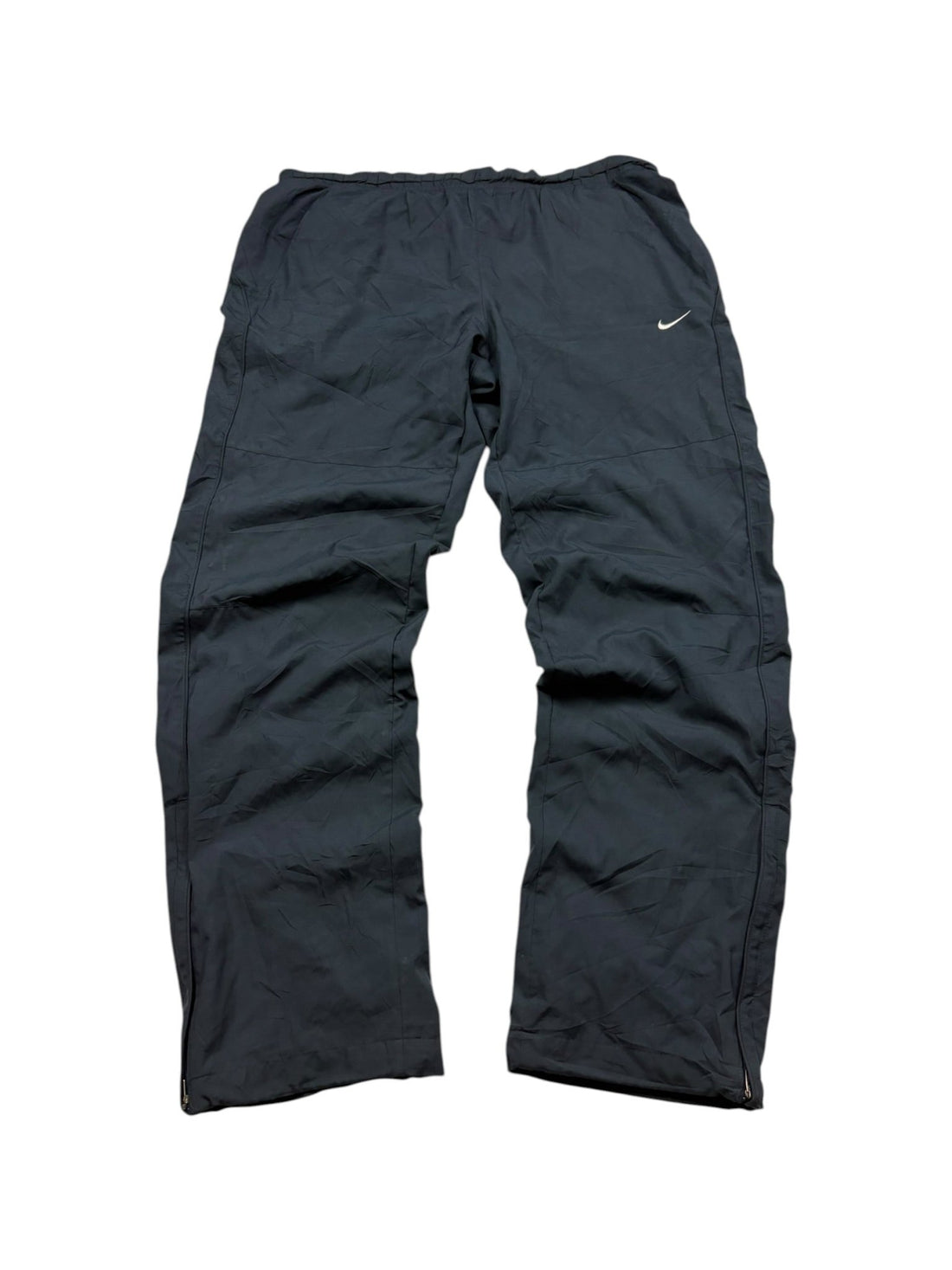 Nike Open-Leg Vintage Trackpants Navy Größe M Frontansicht mit weitem Baggy-Schnitt und Mini-Swoosh